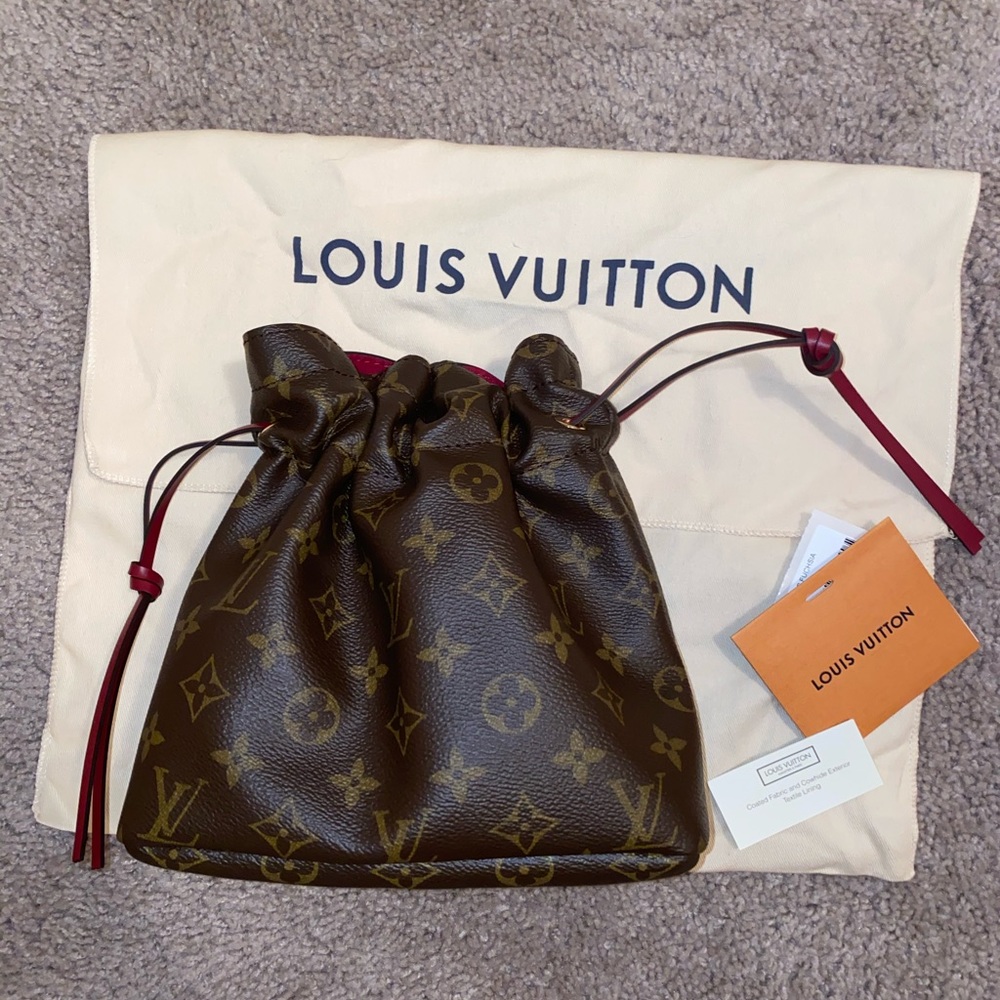 Louis Vuitton pouch bag .